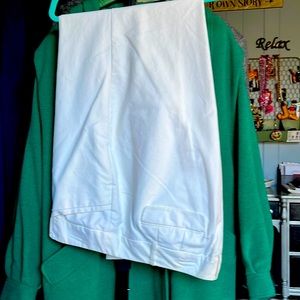 2 pair of Women’s white slacks.